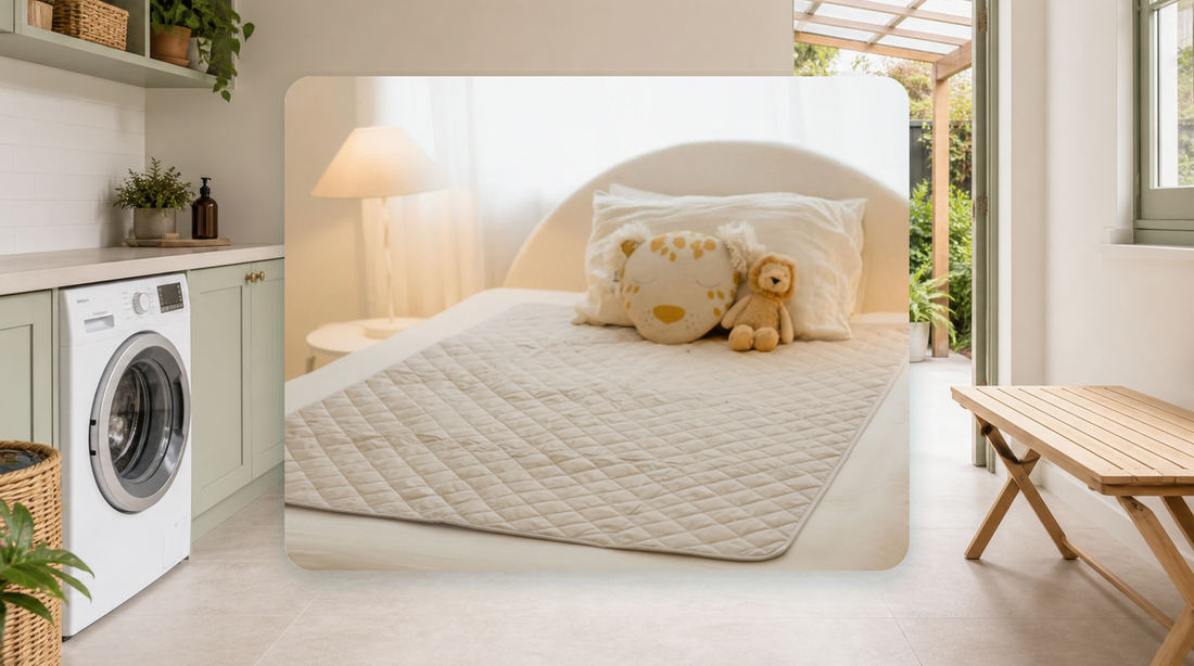 Rudie Baby Beige Leakproof Bed Guard beside a bright family laundry