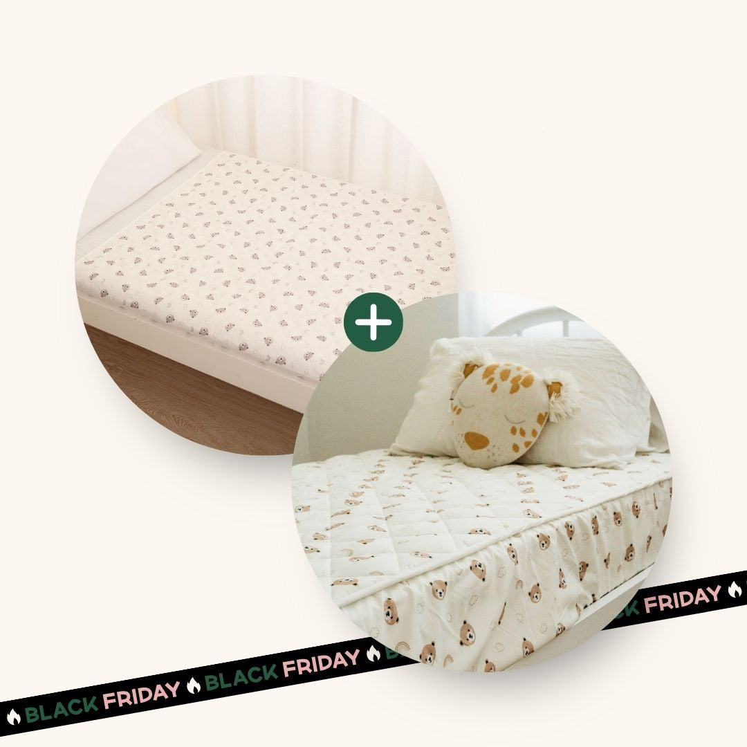 Baby mattress with pillow and blanket set on a white background, featuring a Black Friday sale banner.
