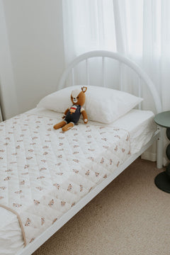 Rudie Baby Bobby's Complete Bundle lifestyle photo with Bobby Bear plush