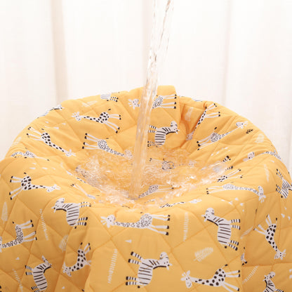 Rudie Baby leakproof bed guard in Giraffes print, hanging display