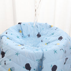 Rudie Baby leakproof bed guard in Whales print, hanging display
