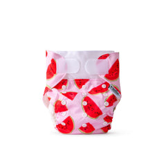 Rudie Baby DryStart toilet training diaper, styled flat lay