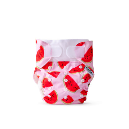 Rudie Baby DryStart toilet training diaper, styled flat lay