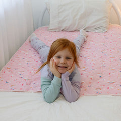 Rudie Baby leakproof bed guard on bed