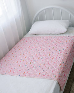 Rudie Baby leakproof bed guard styled on children's bedroom bed