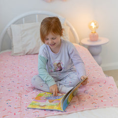 Rudie Baby leakproof bed guard on toddler bed